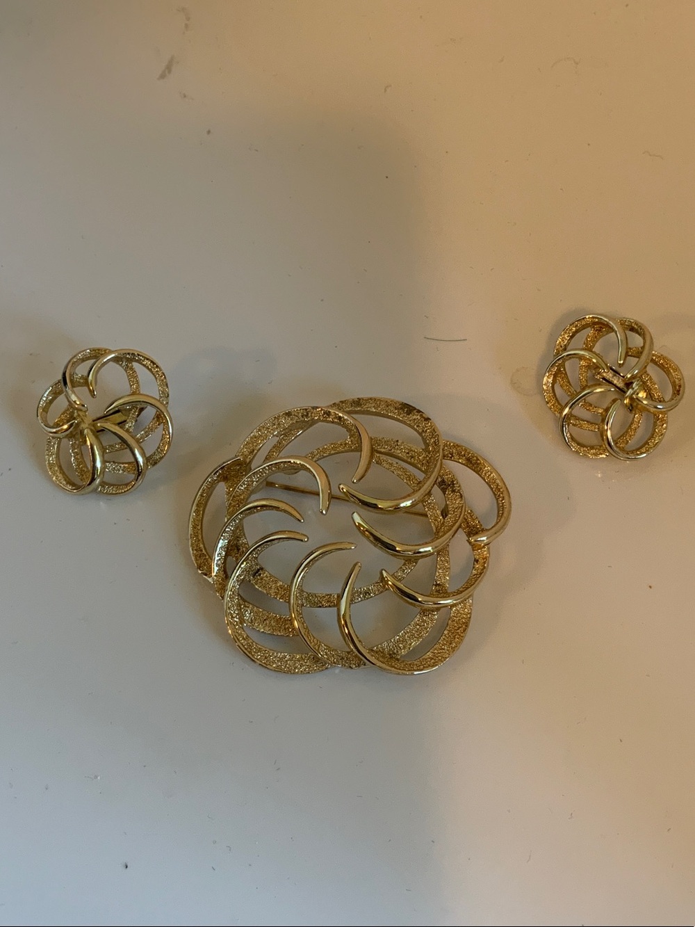 Sarah Coventry Gold-Tone Floral Swirl Brooch with Matching Stud Earrings